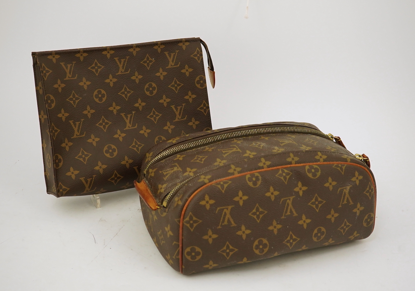 Two Louis Vuitton wash bags